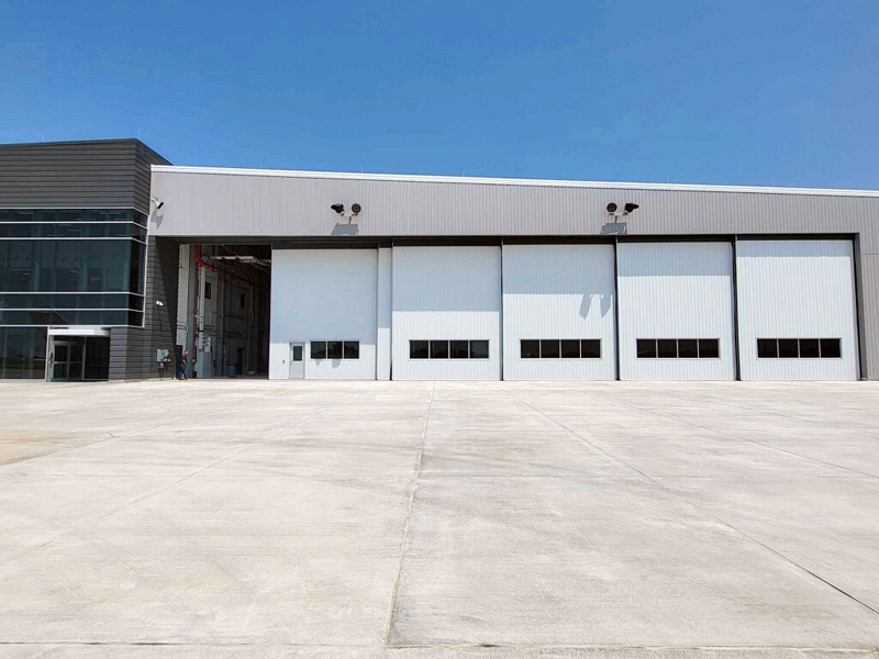 Corporate Hangar - One-Way Door System