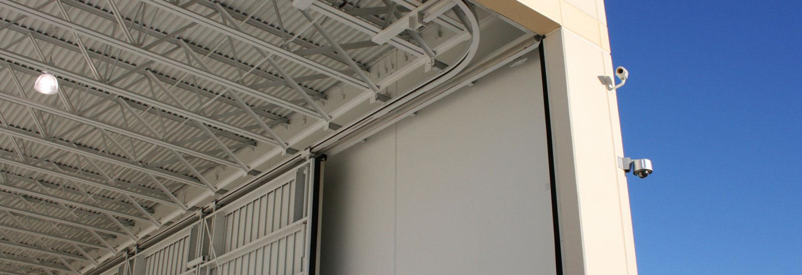 Welcome To Norcomfg Com With The 90º Door System From Norco Building Space Is Maximized Because Panels Individually Along Interior Sidewalls